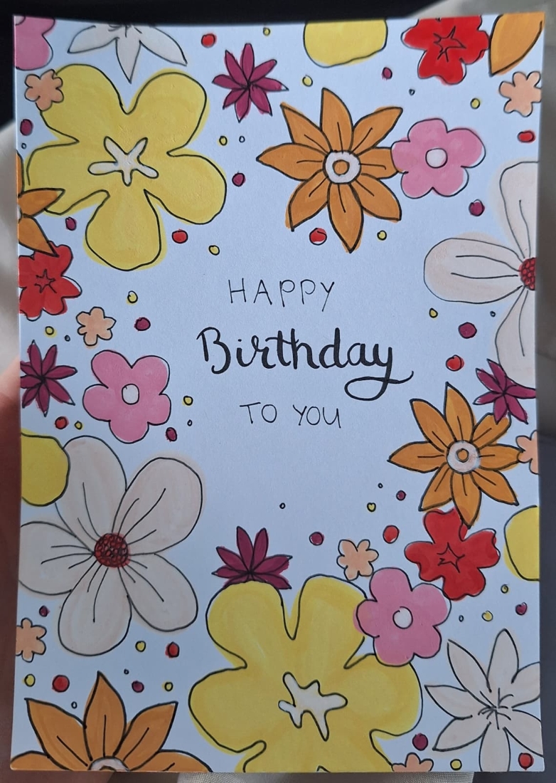 verjaardagskaart met gekleurde bloemen